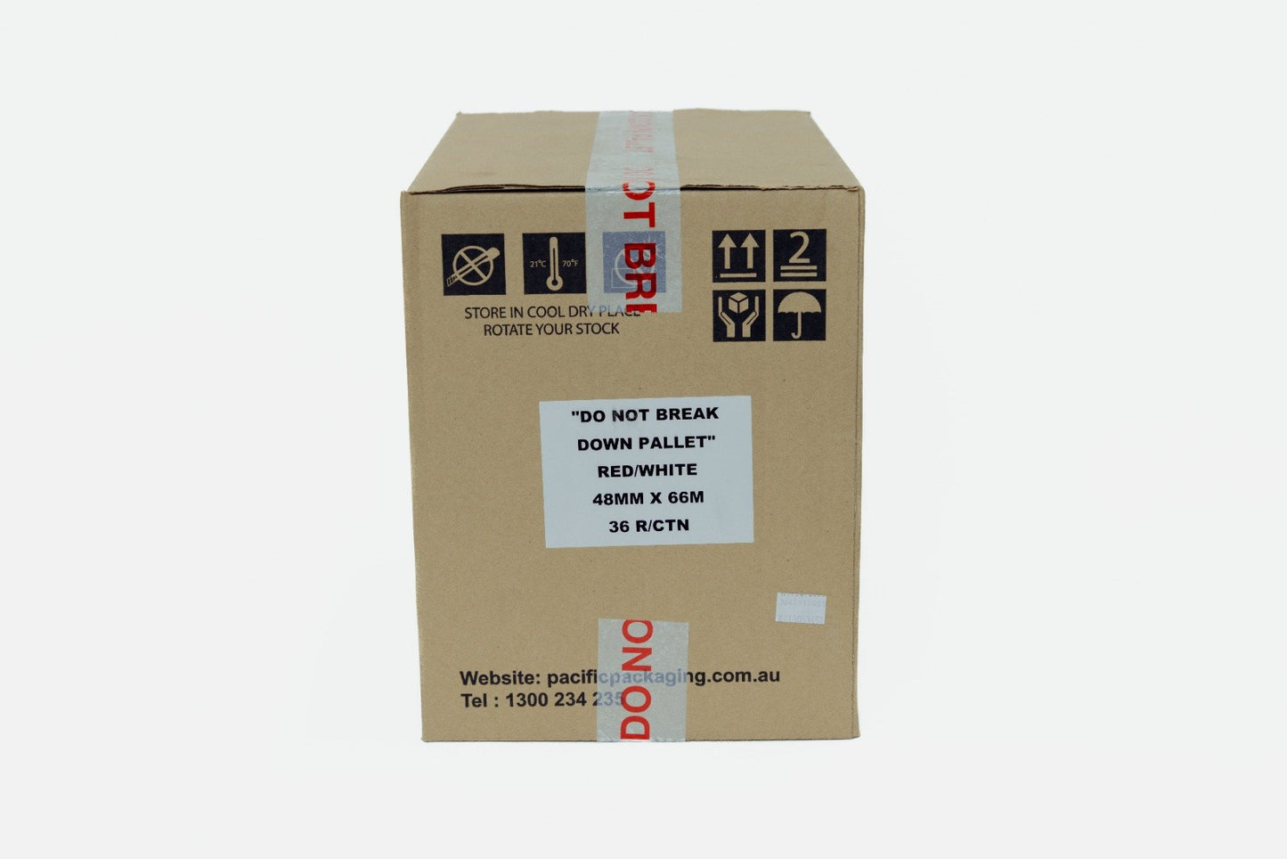 Cardboard box with shipping labels and text on a white background