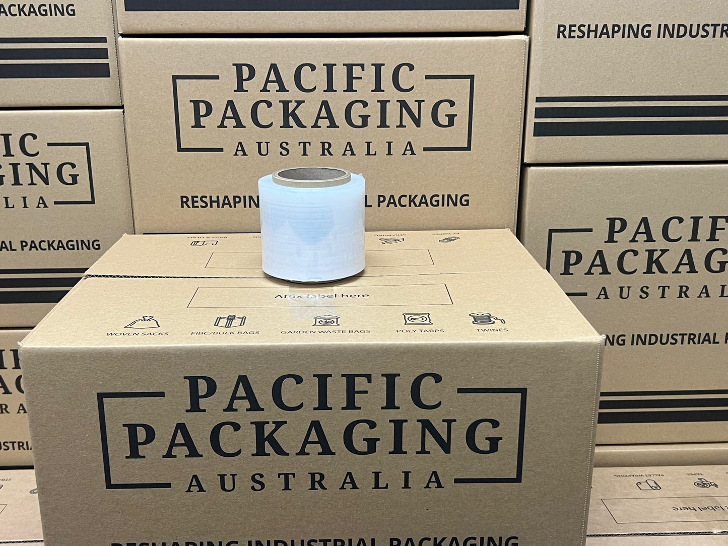 Box with a roll of tape on top of Pacific Packaging Australia boxes