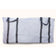 white woven polypropylene moving bag folded with black woven carrying straps on white background