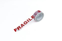 Roll of tape with 'Fragile' text on a white background