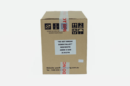 Cardboard box with shipping labels and text on a white background