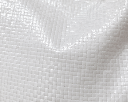 Close-up of White Laminated Woven Polypropylene Feed Bag texture