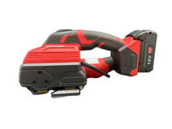 QC31-19 battery-powered automatic strapping machine rear view, showing housing, battery pack, control panel, cable reel.