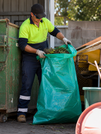 Green tint LDPE mining bag in use, bottom seal visible, filled with contents