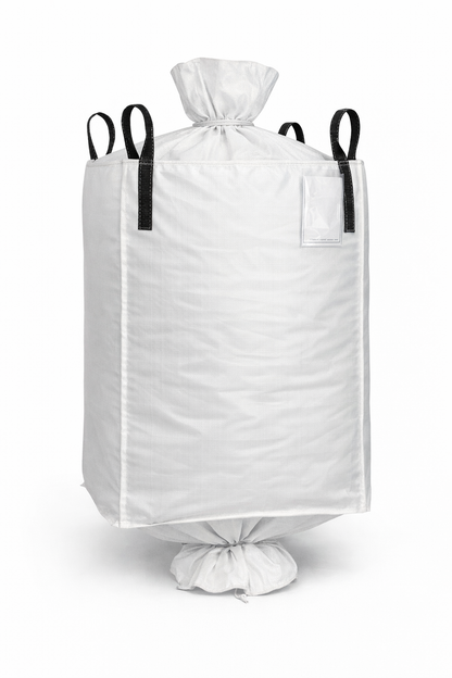 FIBC bulk bag standing with tied top drawstring and tied bottom spout, black lifting loops on white background