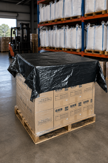 Black HDPE Pallet Cap on pallet in warehouse setting