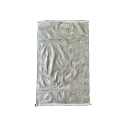white woven polypropylene sack lying flat on black background