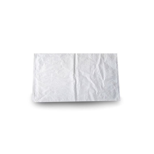 White poly mailer lying flat on white background, crinkled polyethylene shipping bag with sealed left seam