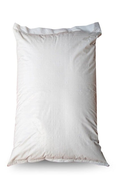 White woven polypropylene grain sack standing upright on white background