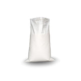 White woven polypropylene sack standing upright on white background casting shadow