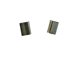 Two metallic cylindrical objects on a white background